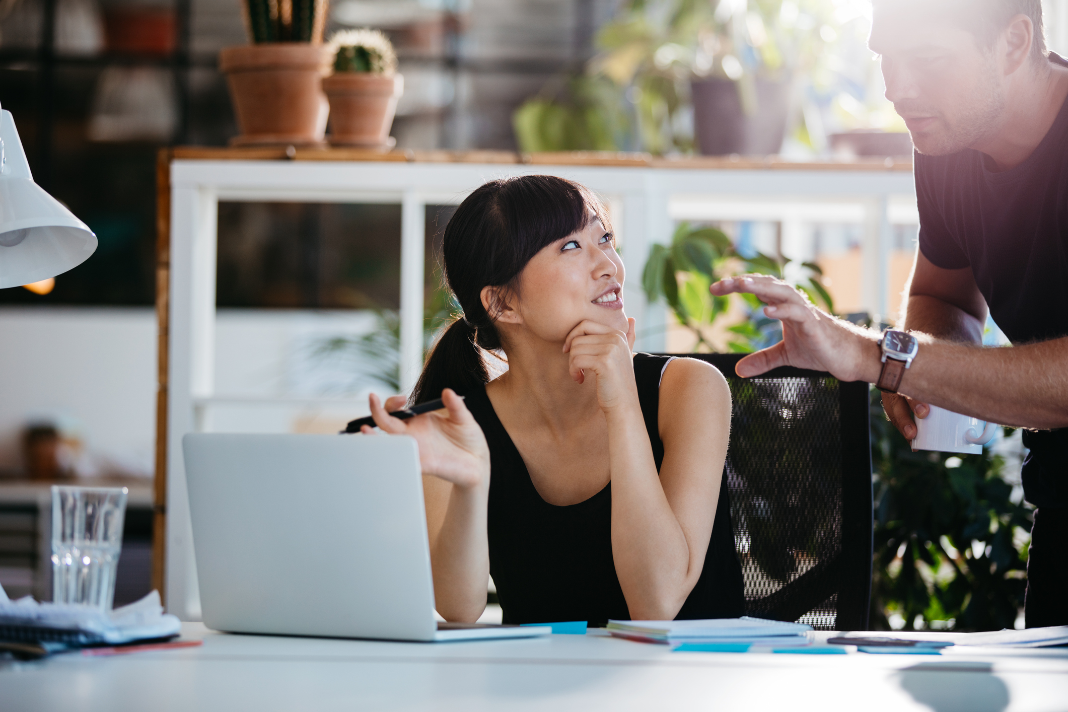 Woman sits at computer