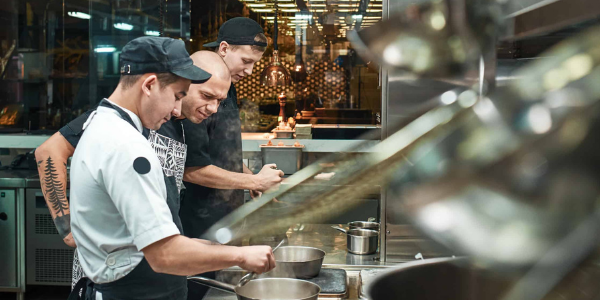 professional cooks in kitchen