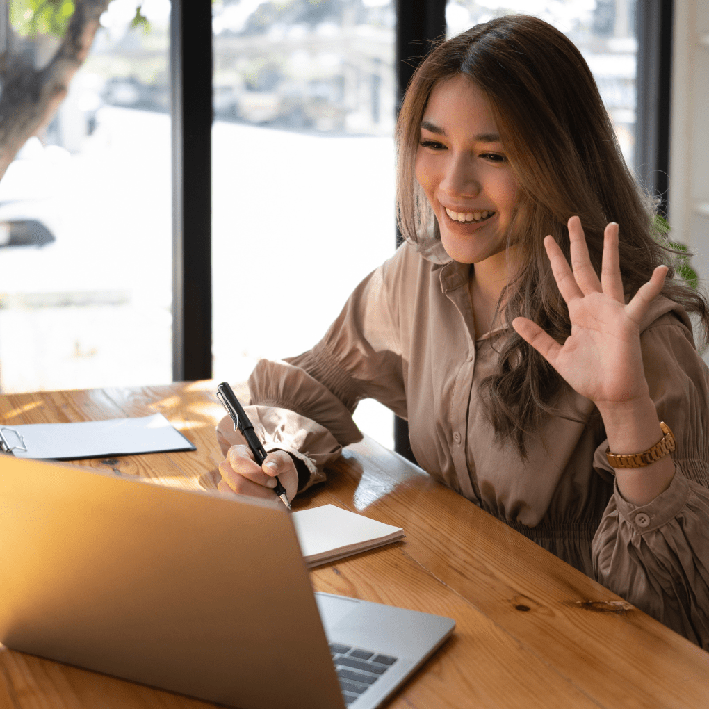 Woman smiling on video conference