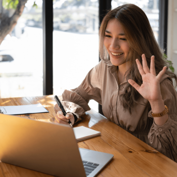Woman smiling on video conference